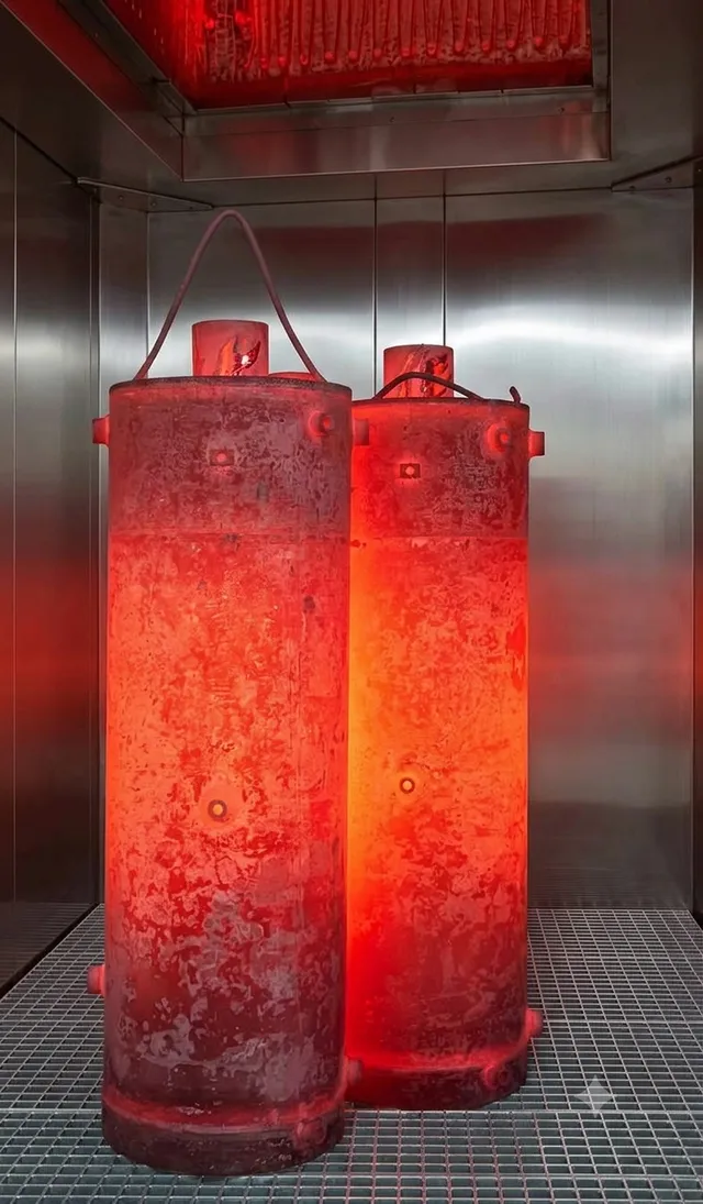 Enamel-coated water heater tanks in the firing furnace